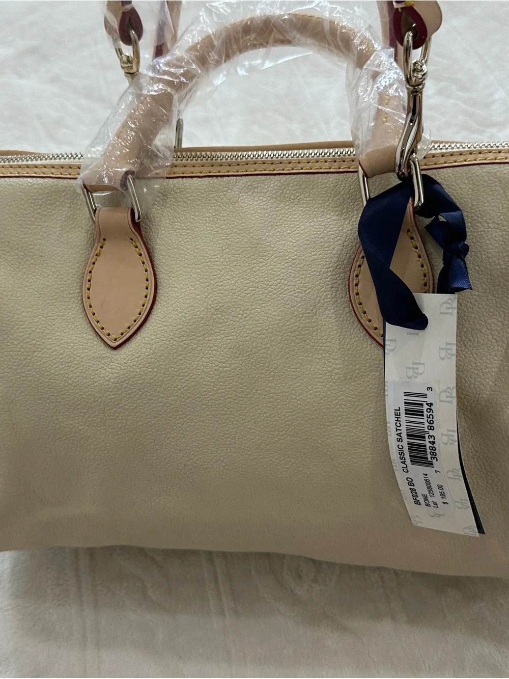 Dooney & Bourke Cream Leather Satchel with Tan Trim and Navy Tag Accent